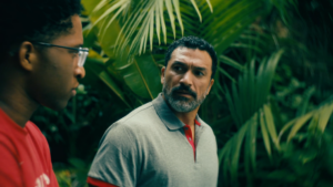 Jackson (Michael Alisa) talks to Kai (Lex Lumpkin)